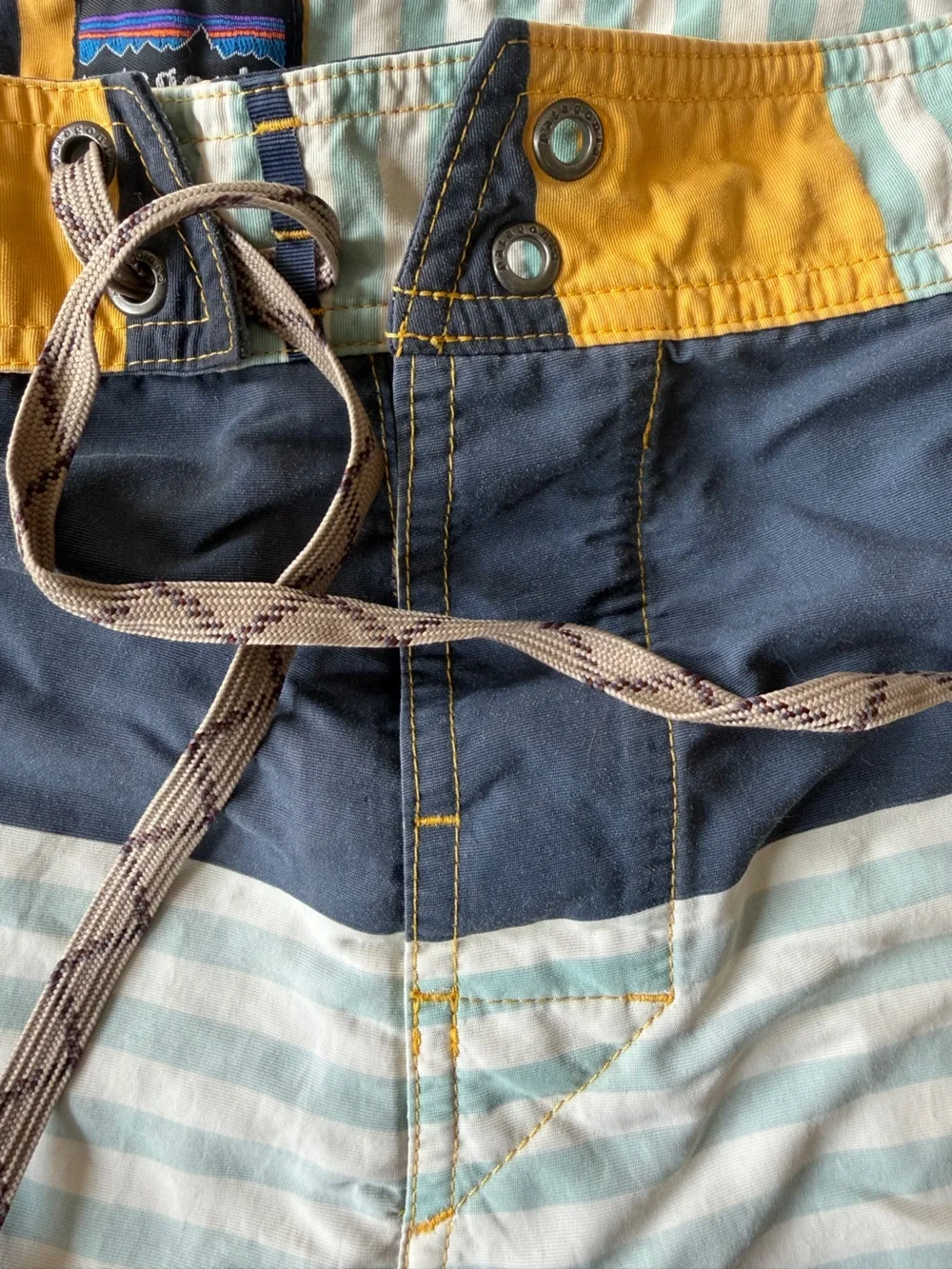 Patagonia Men’s Navy, Yellow & Light Blue Striped Board Shorts